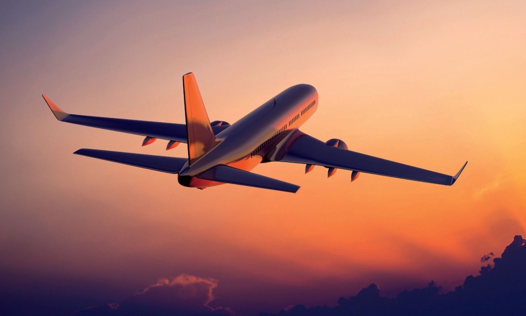 https://d3r8gwkgo0io6y.cloudfront.net/upload/NK/airplane-in-the-sunset.jpg
