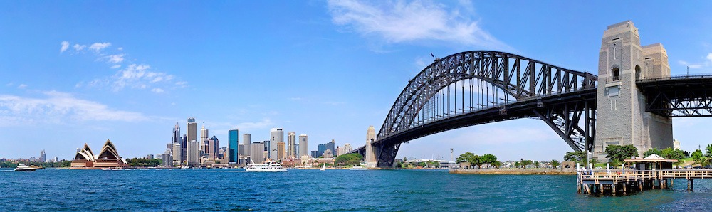 https://d3r8gwkgo0io6y.cloudfront.net/upload/sydney-harbour-with-city-skyline-and-sydney-harbour-bridge-panorama-sydney-harbour-sydney-panorama-345144242.jpg